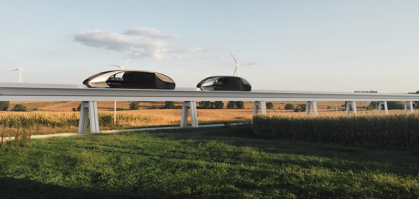 Two shuttles crossing farmland